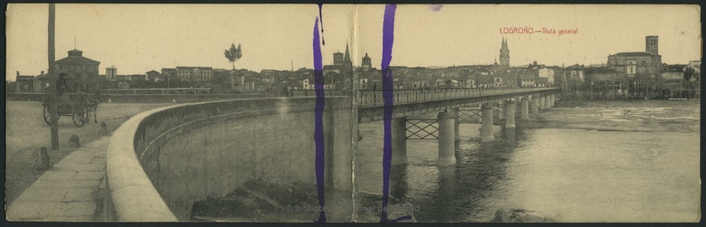 Vista general de Logroño de 1923 en color sèpia amb dues taques verticals liles al mig de la vista